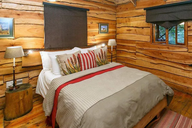 كوخ بشرفة، Riverside Lodge 1/2