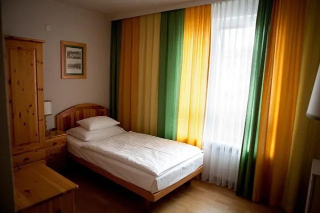 غرفة مفردة، Hotel Caroline 6/8