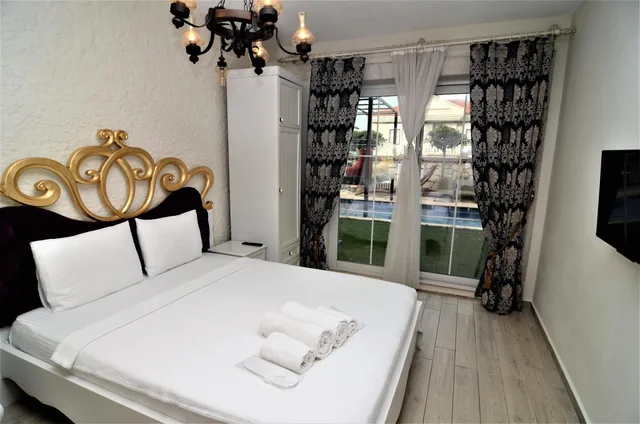 غرفة ثلاثية بإطلالة على المسبح، Alacati Grand Eldoris Otel 2/10