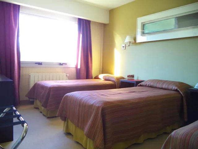 غرفة كلاسيكية ثلاثية بسرير مزدوج وسرير فردي، Mil 810 Ushuaia Hotel 1/2