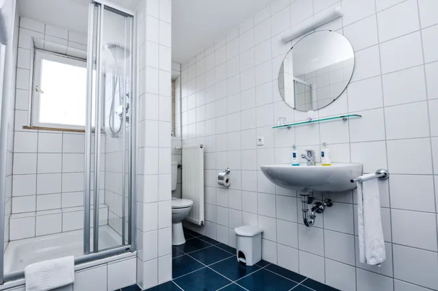 غرفة مفردة بسرير فردي، Hotel Garni Metzingen 4/4