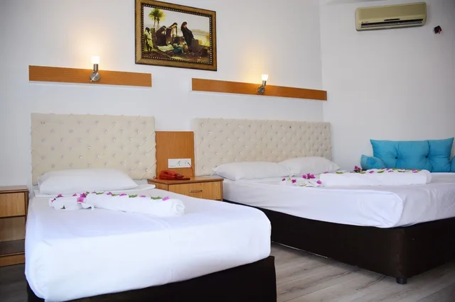 غرفة قياسية ثلاثية بسرير مزدوج وسرير فردي، Miranda Moral Beach Hotel 4/10