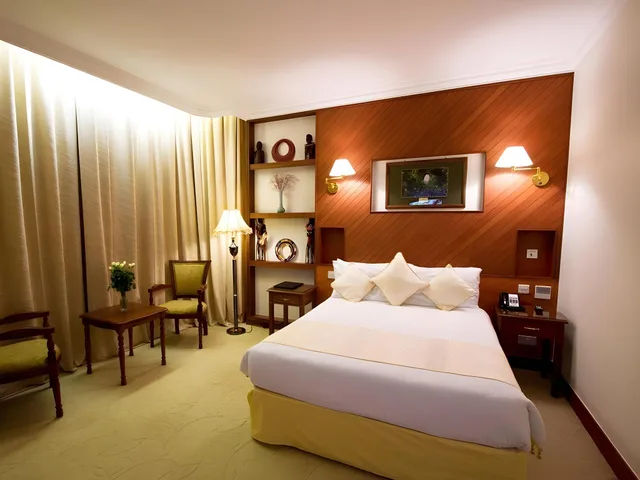 غرفة ديلوكس بسرير كوين، Palace Hotel Arusha 1/3