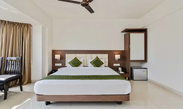 غرفة ديلوكس بسرير كوين، Treebo Staycation Holiday 2/7