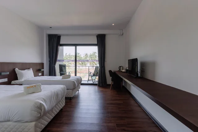 غرفة ديلوكس بسريرين منفصلين، Roxy Sematan Villa And Townhouse 2/2
