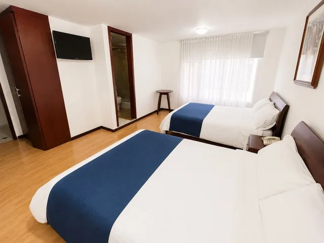 Room, 2 Queen Beds, Nogal Suite Hotel Pasto 4/8