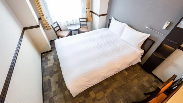 غرفة بسرير كوين للمدخنين، Toyoko Inn Shin-osaka Higashi-mikuni Ekimae 5/6