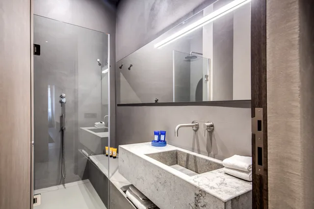 غرفة بريميوم ثلاثية بسرير كوين وسرير فردي، Elysium Suites Collection 6/8