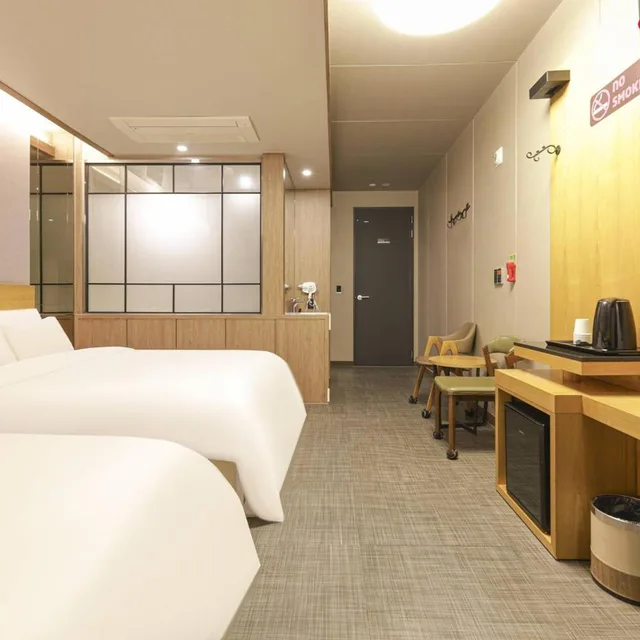 غرفة كبيرة بسريرين منفصلين، Jinju Kai Hotel 3/3