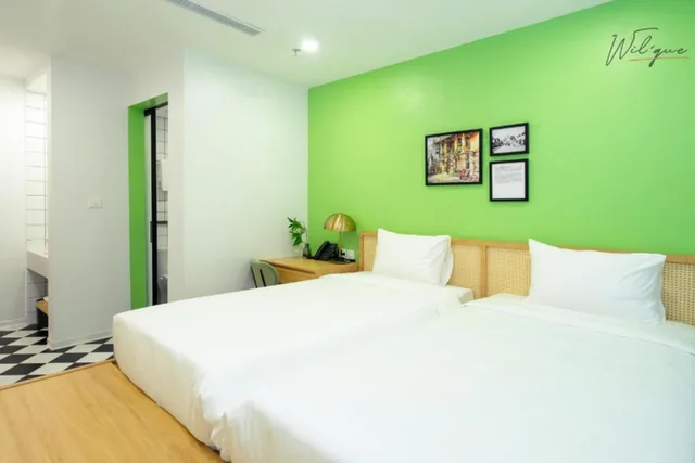 غرفة ديلوكس بسرير كوين بإطلالة على المدينة، Wilque Hotel Hanoi 1/4