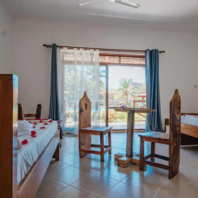 غرفة ثلاثية بإطلالة على الحديقة، Bella Vista Resort Zanzibar 1/5