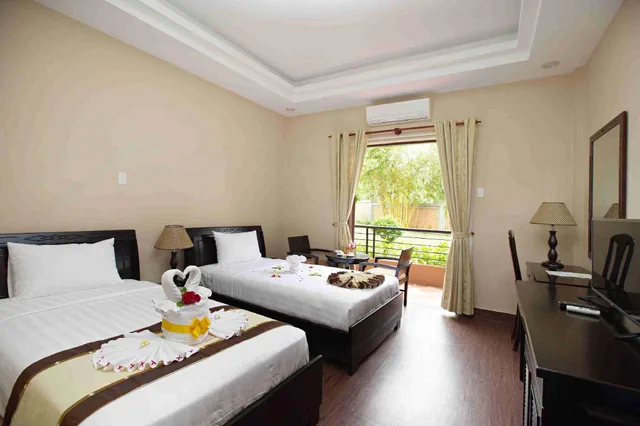 جناح ديلوكس بإطلالة على الحديقة، Blue Bay Mui Ne Resort Spa 1/1