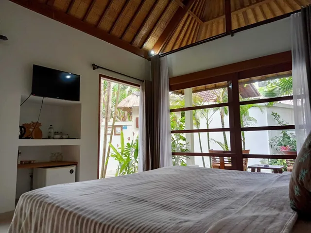 غرفة ديلوكس بسرير كينج بإطلالة على الحديقة، Balisanti Bungalows 2/3
