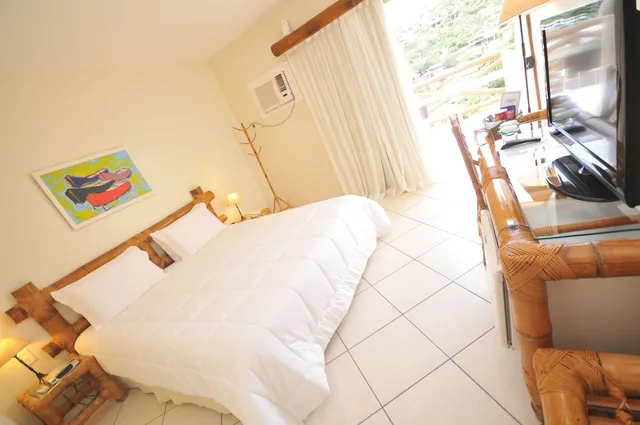غرفة قياسية بسرير كينج بإطلالة على الحديقة بشرفة، Rio Búzios Beach Hotel 1/3