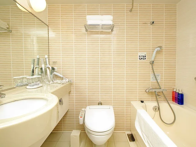 غرفة قياسية بسريرين منفصلين للمدخنين، Richmond Hotel Kochi 3/3