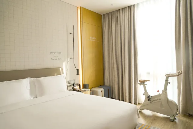 غرفة بريميوم بسرير كينج بإطلالة على المدينة، Even Hotels Shenzhen Nanshan 6/7