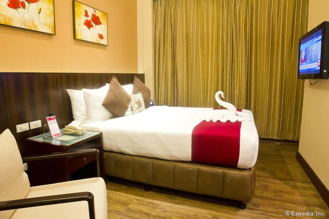 غرفة سوبيريور بسرير كوين، Ramada by Wyndham Manila Central 7/10
