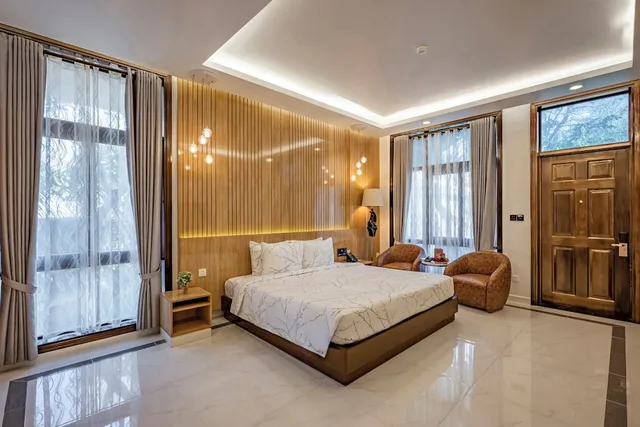 جناح عائلي بسريرين منفصلين وسرير كينج بإطلالة على البحر بغرفتي نوم، Carmelina Beach Resort 3/10