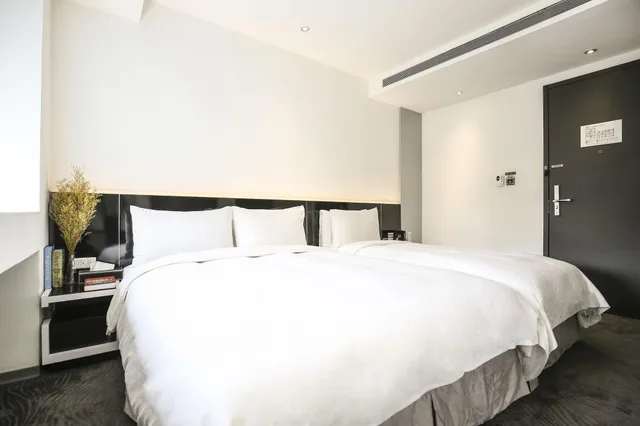 غرفة ديلوكس ثلاثية بإطلالة على المدينة بحوض استحمام، CityInn Hotel Plus Taichung Station Branch 1/6
