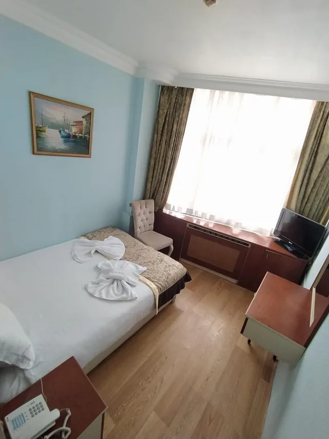 غرفة مفردة بسرير كينج، Turvan Hotel 1/2
