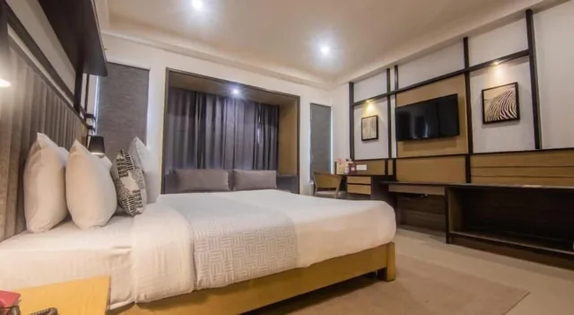 غرفة عائلية بسرير كينج، Purple Cloud Hotel 2/5