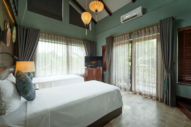 جناح دوبلكس بسرير كينج وسريرين منفصلين بشرفة، Aira Boutique Hoi An 3/6