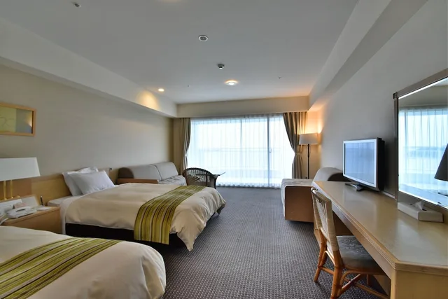 غرفة ثلاثية بثلاثة أسرّة بإطلالة على البحر، Hotel Harvest Nankitanabe 1/10
