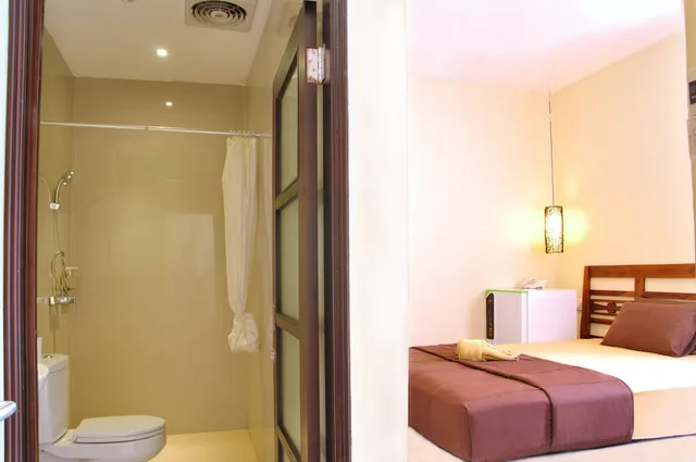غرفة ديلوكس بسرير كوين، Kuta Sari House 1/4