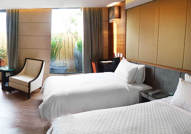غرفة رباعية بسريرين مزدوجين، Royal Group Hotel Chun Shan Branch 1/4