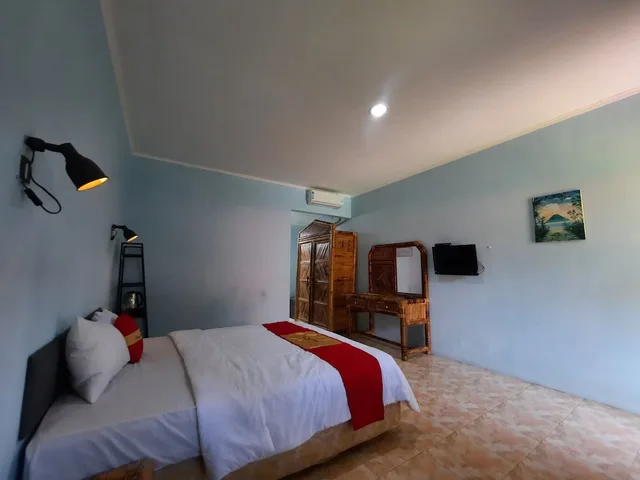 غرفة ديلوكس بسرير كوين بإطلالة على المسبح، Hotel Pesona Bulan Baru Senggigi 1/5