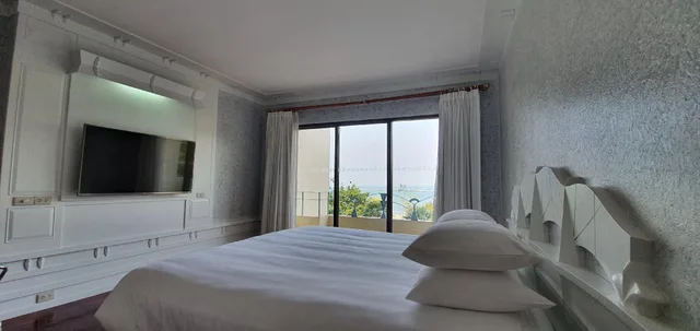 جناح جونيور بسرير كينج بإطلالة على البحر، Garden Sea View 1/1