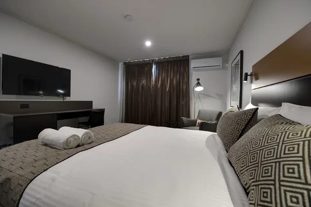 غرفة تنفيذية بسرير كوين، Cbd Motor Inn 2/8