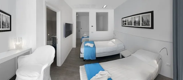 جناح جونيور بسرير كوين، Hotel Europa Monetti 3/3