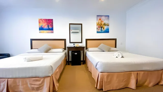 غرفة عائلية بسريرين كوين، Desa Queenspark Hotel 1/2