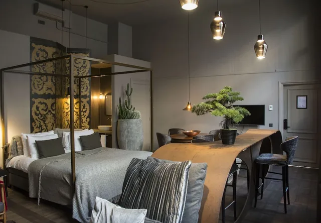 جناح رئاسي بسرير كينج بحوض استحمام في الطابق الأرضي، Boutiquehotel Staats 7/10