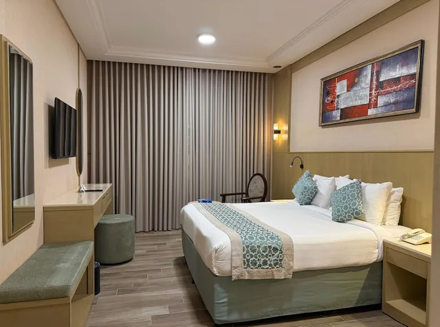 Connecting, 1 Double and 3 Single Beds، فندق عفراء(Afraa Hotel) 4/10