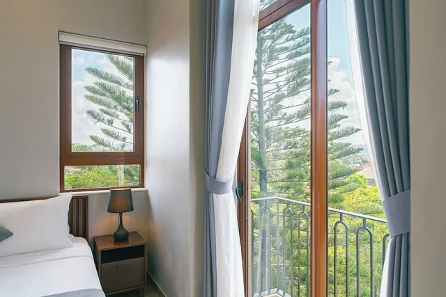 غرفة ديلوكس رباعية بسريرين كوين بشرفة، Duy Long Hotel 5/6