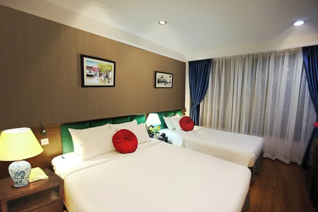 غرفة ديلوكس بسرير كوين، Aviary Hanoi Hotel and Travel 1/8
