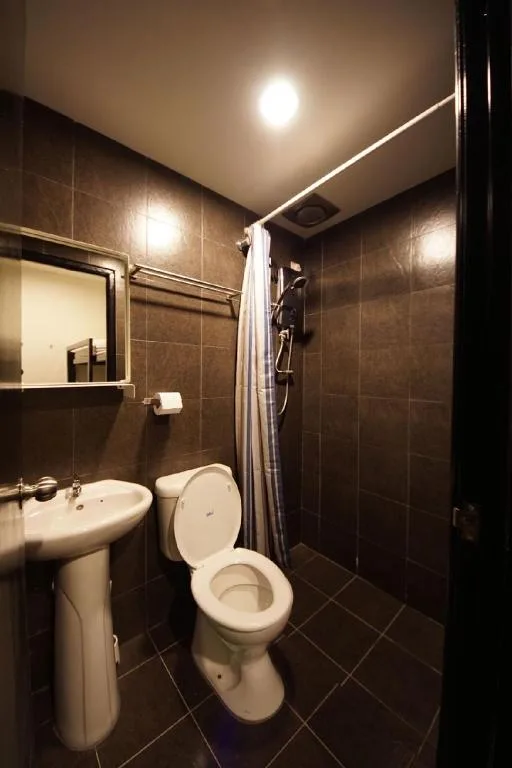 غرفة بسرير فردي وسرير بطابقين، Tulip Hotel 1/5