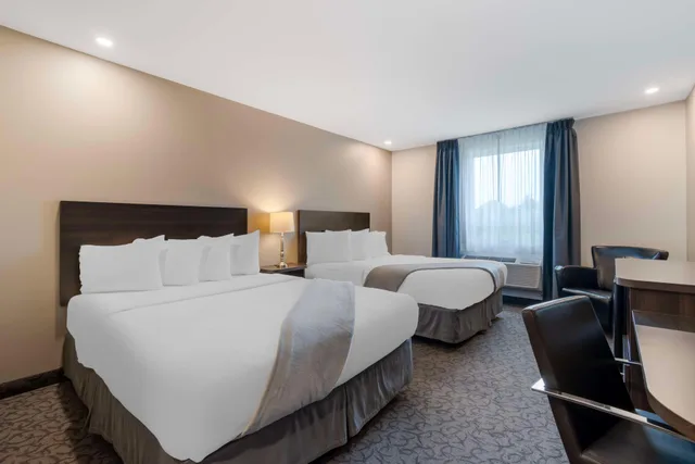 غرفة رباعية، Villa Inn and Suites, SureStay Collection By Best Western 2/4