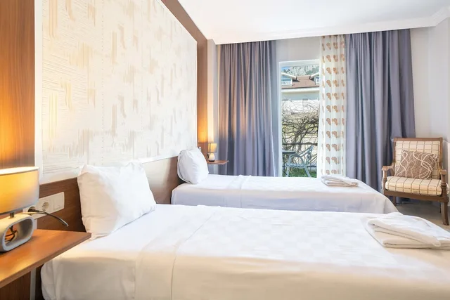 غرفة بسرير مزدوج أو سريرين منفصلين بشرفة، Dedeminn Garden Hotel 6/10