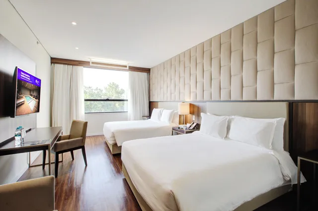 غرفة ديلوكس بسرير مزدوج أو سريرين منفصلين بإطلالة على المسبح بغرفة نوم واحدة، DoubleTree by Hilton Foz do Iguacu 1/10