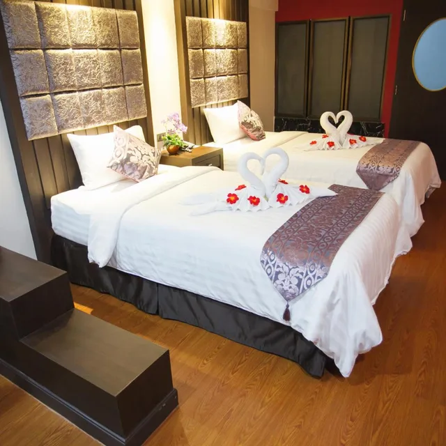 غرفة ديلوكس بسريرين منفصلين، Grand Pink Hotel Hat Yai 3/6