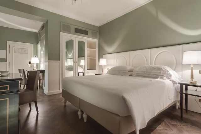 غرفة كلاسيكية ثلاثية بسرير كوين وسرير فردي، Plaza Hotel Lucchesi 1/4