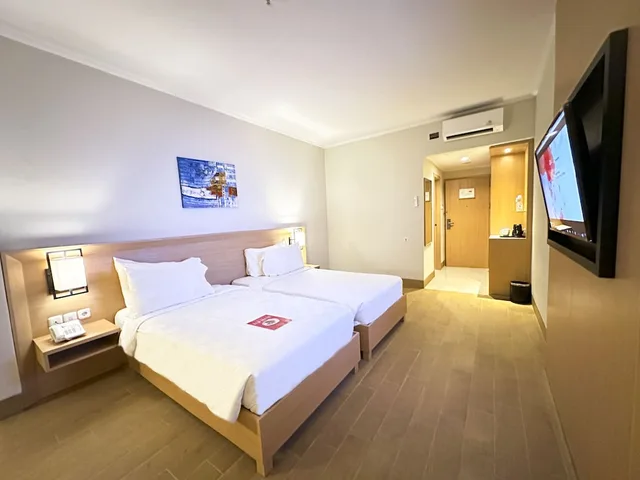 Deluxe, Twin Beds, Pool Access, Large، SWISS-BELHOTEL MANOKWARI 4/6