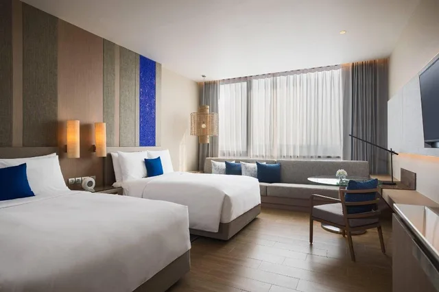 غرفة بسريرين منفصلين، Renaissance Pattaya Resort Spa 7/14