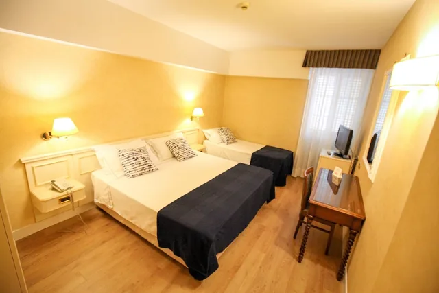 غرفة قياسية ثلاثية بسرير مزدوج وسرير فردي، Hotel I Gigli 2/5