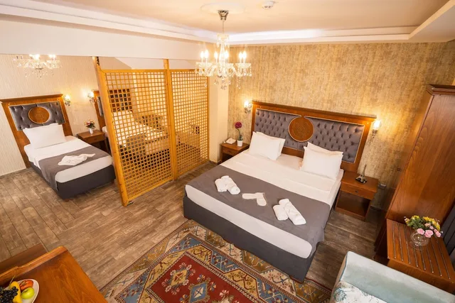 غرفة اقتصادية رباعية بسريرين منفصلين وسرير كينج مع أريكة في الطابق الأرضي، Ala Sofia Hotel 9/10