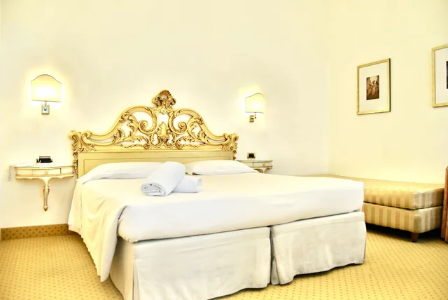 غرفة كلاسيكية ثلاثية بسرير مزدوج وسرير فردي، Gardena Hotel 1/3