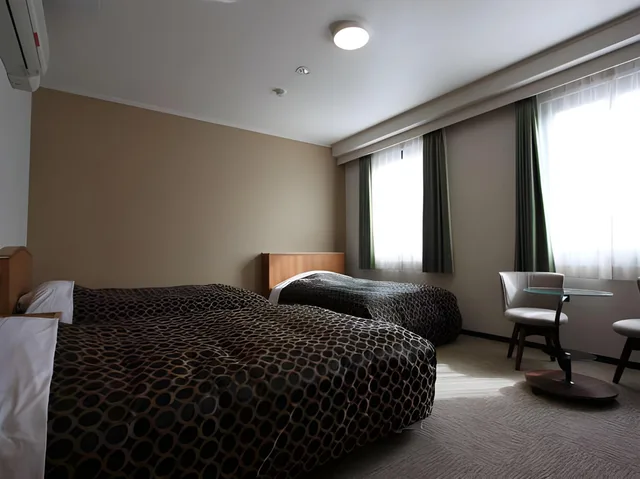 غرفة بسريرين منفصلين بحوض استحمام للمدخنين، Fukuoka Arty Inn 1/2